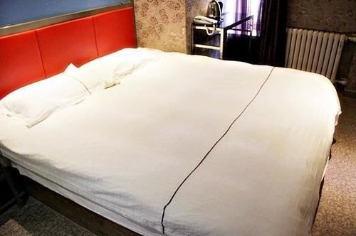 Harbin Xilong Hotel Mai Mai Street Branch Buitenkant foto