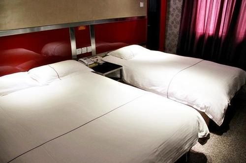 Harbin Xilong Hotel Mai Mai Street Branch Buitenkant foto